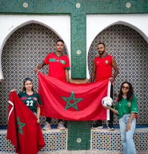 Flag football team huddling before a game outdoors.Flag Football Team Names
