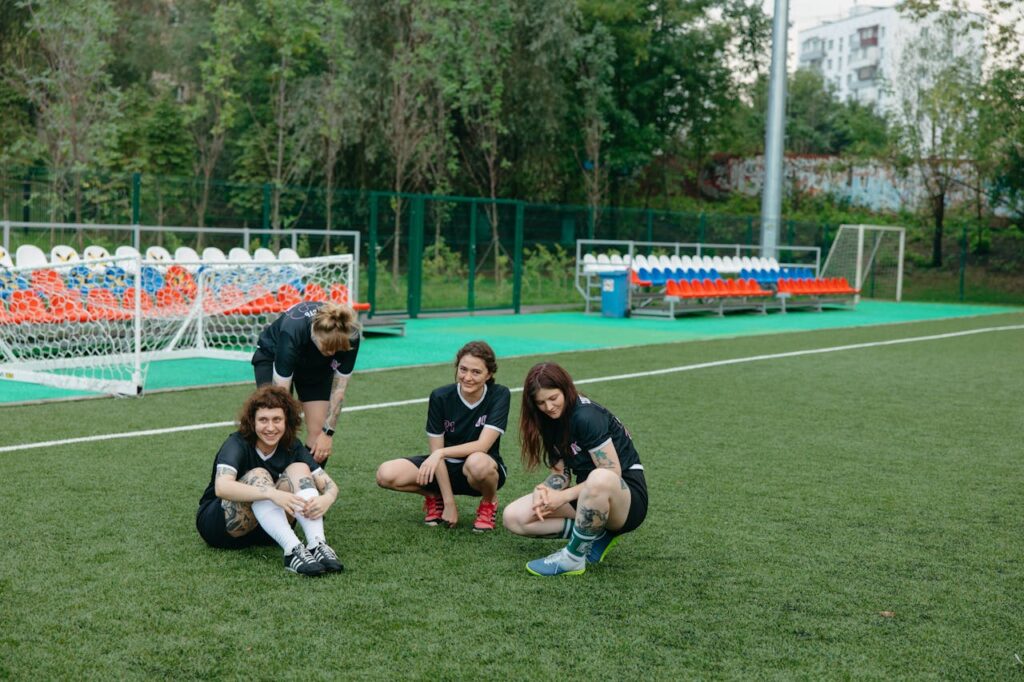 Girl enjoy the football and take some rest