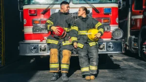 A brave firefighter team standing in front of a fire truck, showcasing unity, strength, and courage perfect inspiration for firefighter team names.