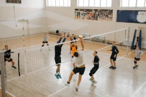 Volleyball team showing strength and determination on the court