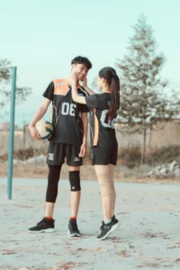 Players laughing and having fun during a volleyball game