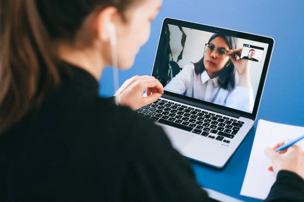 Remote employees engaging in a virtual team-building activity via video call