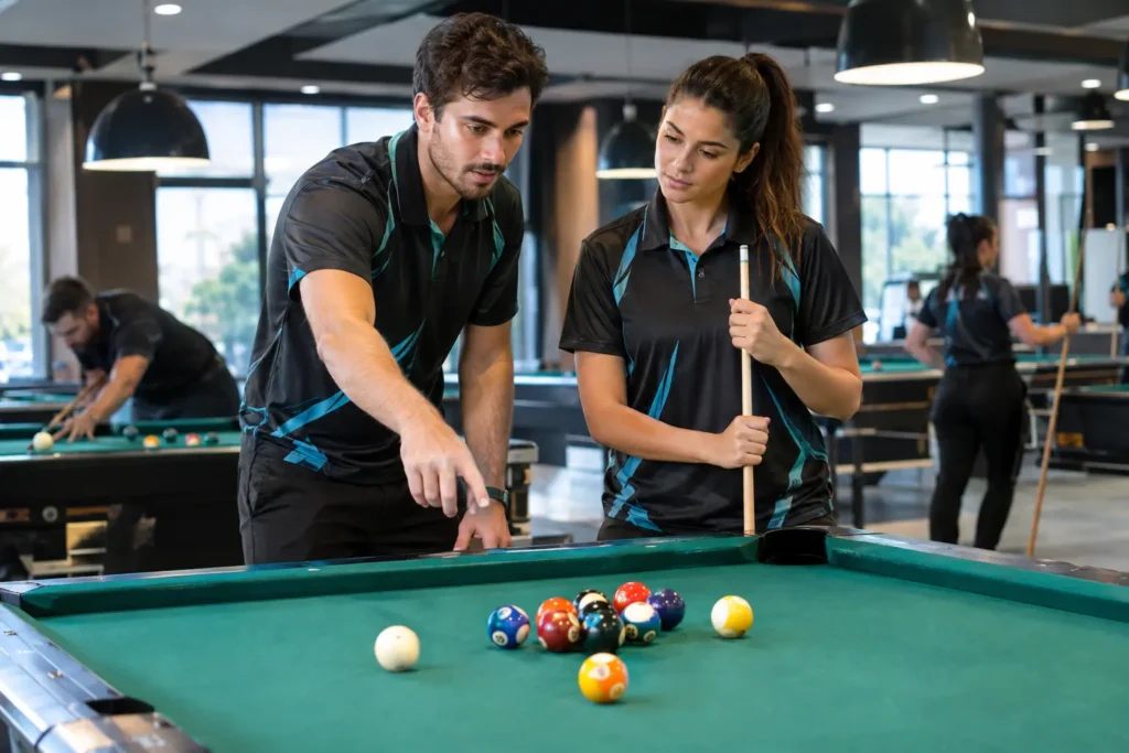 Photorealistic doubles pool team discussing shot at table. Male pointing, female holding cue, matching jerseys, modern pool hall. Pool team names in action.